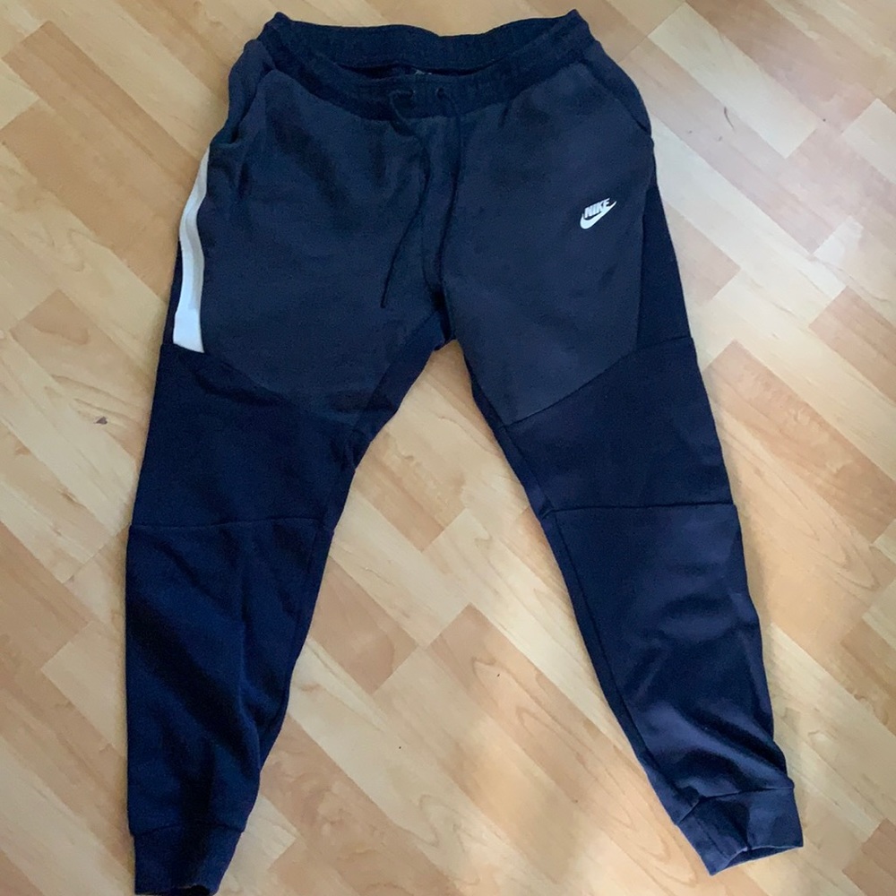 Navy blue athletic Nike sweats